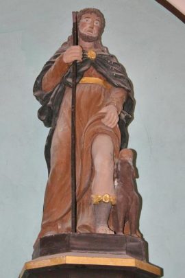 Statue de Saint Roch en pierre peinte du XVIIe siècle